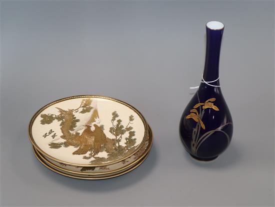 Three Satsuma plates and a blue and white gilt vase Vase H.23cm